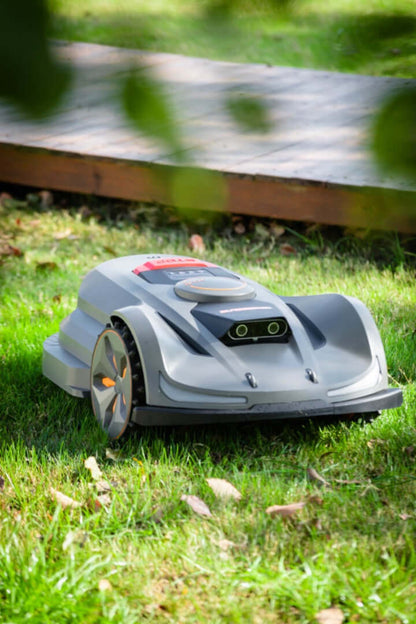 SunSeeker Orion X7 robotic lawn mower on grass, featuring AONaviTM system and advanced Vision AI technology.
